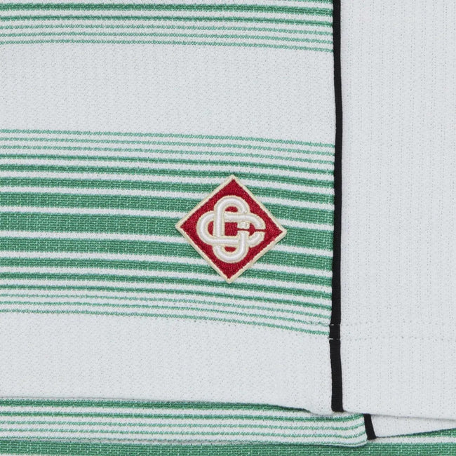 Pantalón corto de felpa interlock con rayas degradadas, verde y blanco