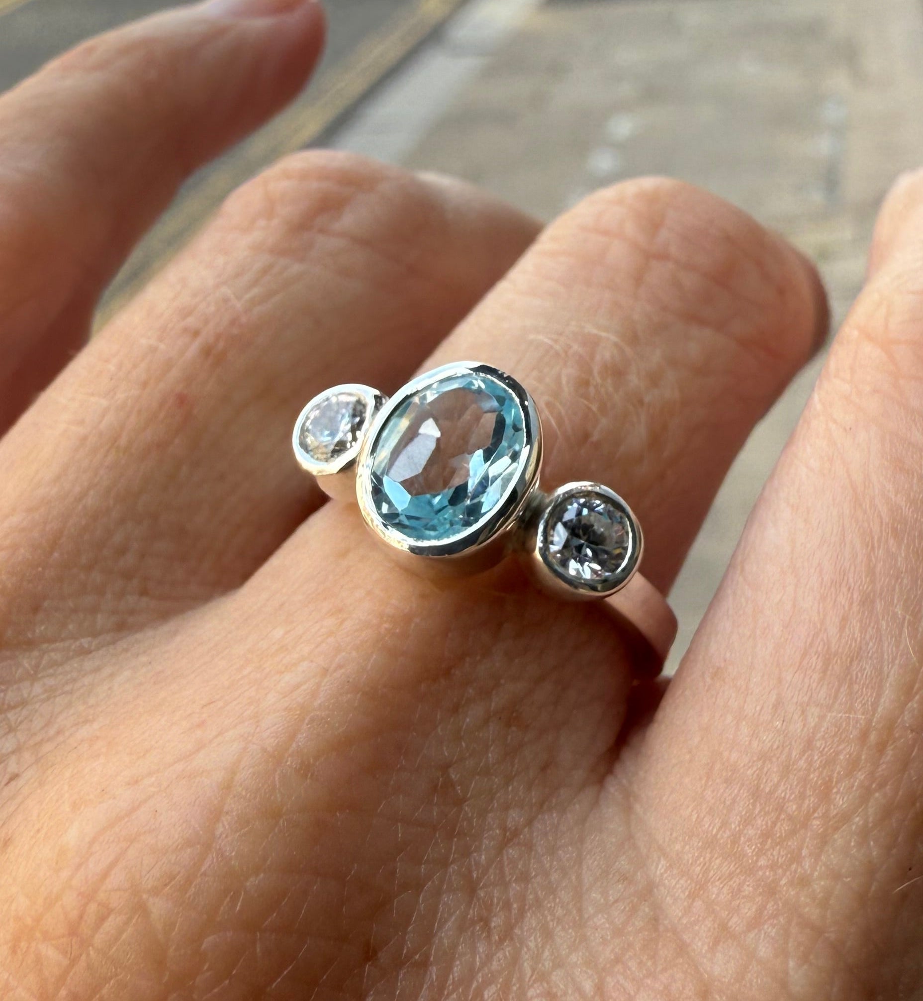 Oval Topaz Trilogy Empire Ring