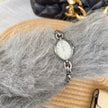 Reloj de pulsera de cuarzo con correa de acero dorada ovalada calada para mujer