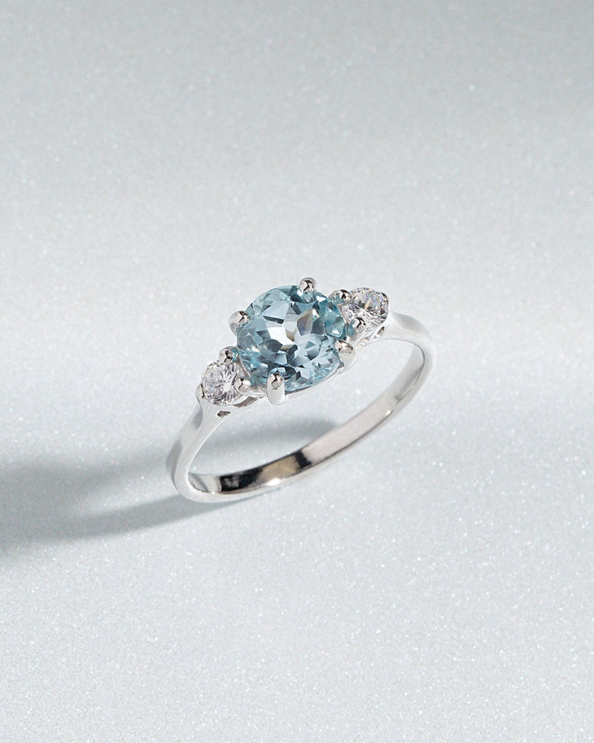 Blue Topaz Three Stone Ring in Sterling Silver
