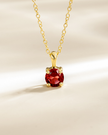 Collar con colgante solitario de granate en vermeil de oro de 18k