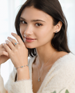 Blue Topaz Oval Stud Earrings in Sterling Silver