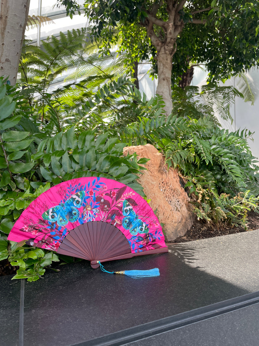 Hot pink 'Fuchsia' silk folding hand fan with butterfly and mushroom painted artwork