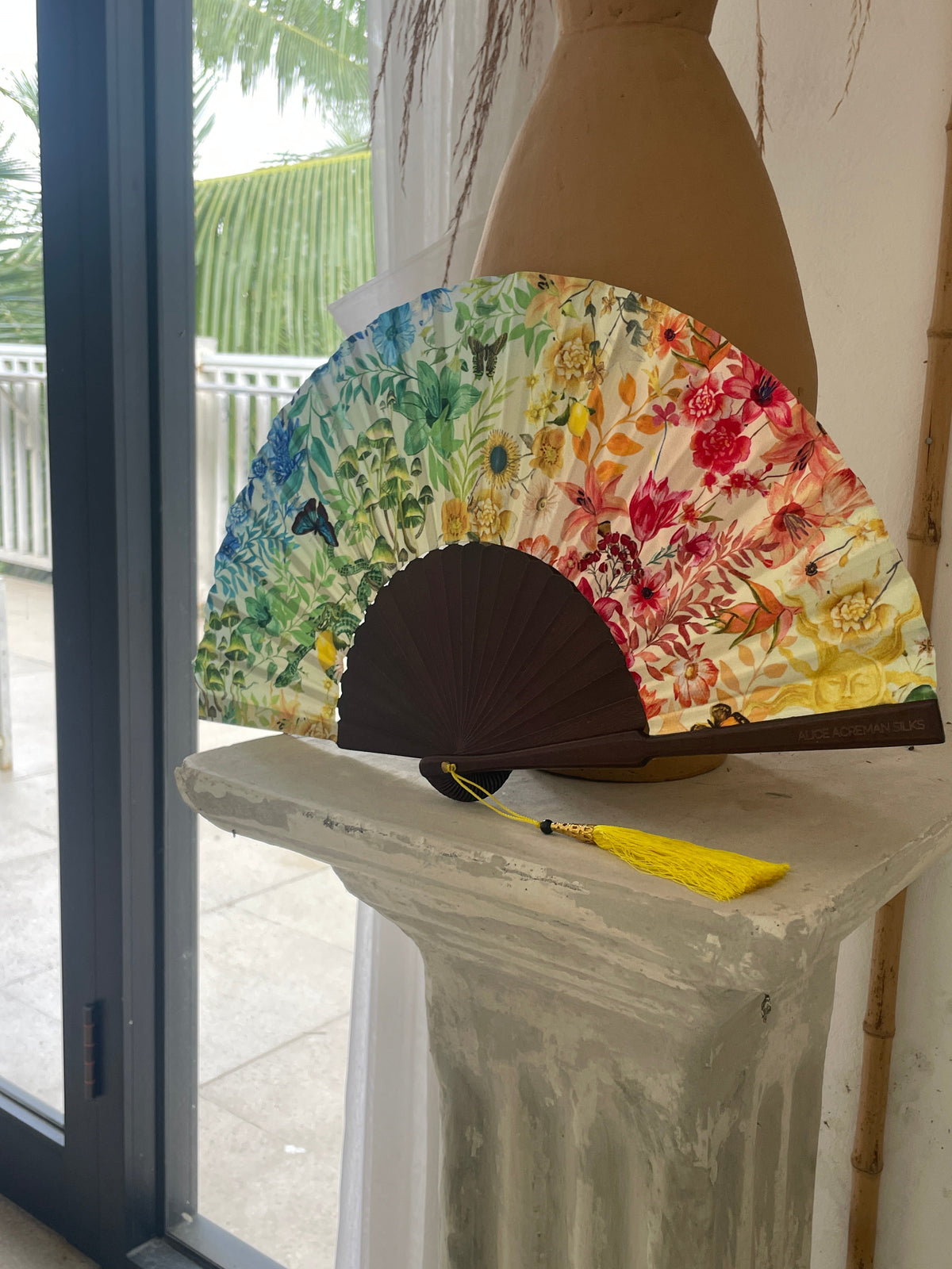 Colourful Silk folding hand fan 'kaleido-bloom' print with floral & nature filled rainbow design