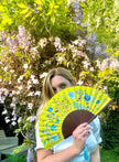 Bright yellow  'Luciferin' silk folding hand fan with flowers and mushroom painted artwork