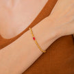 Pulsera de cuentas doradas con piedra natal