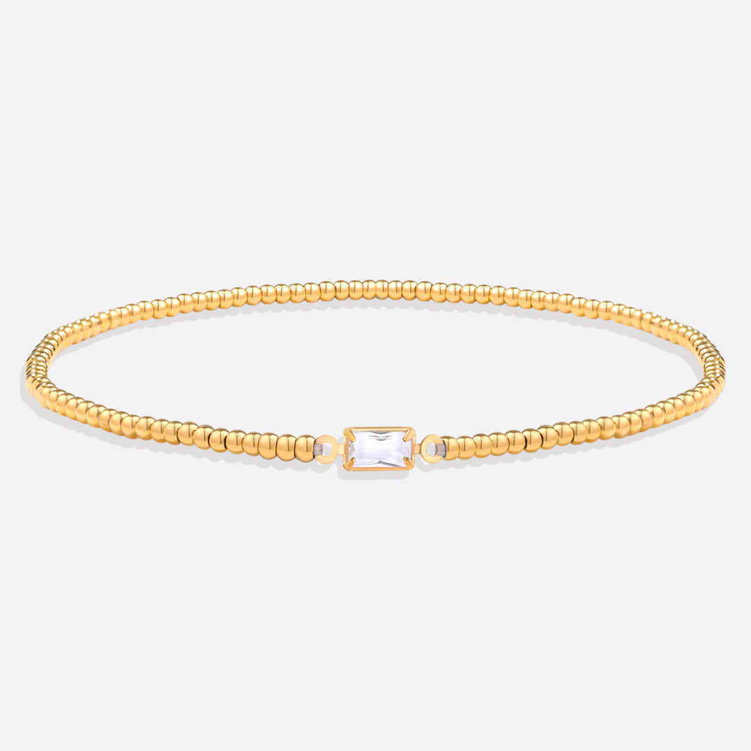 Pulsera de cuentas doradas con piedra natal