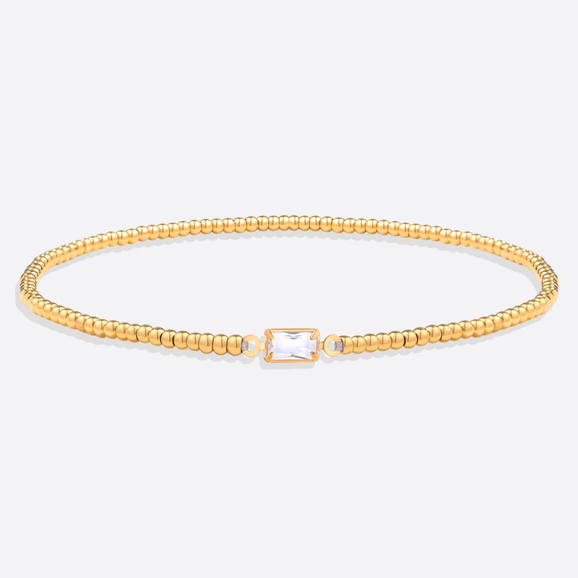 Pulsera de cuentas doradas con piedra natal