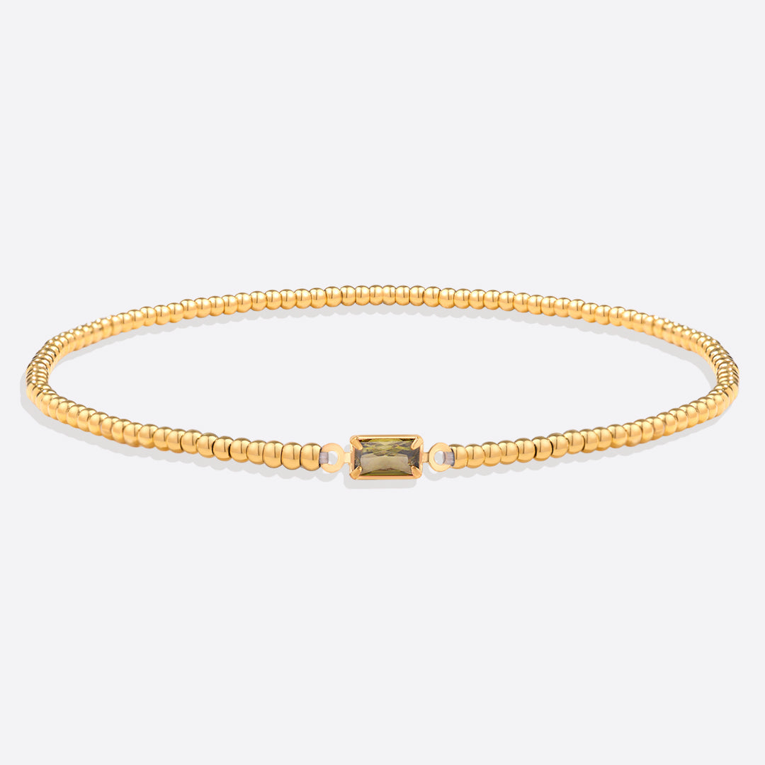 Pulsera de cuentas doradas con piedra natal