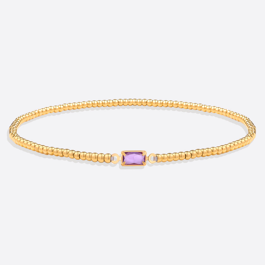 Pulsera de cuentas doradas con piedra natal