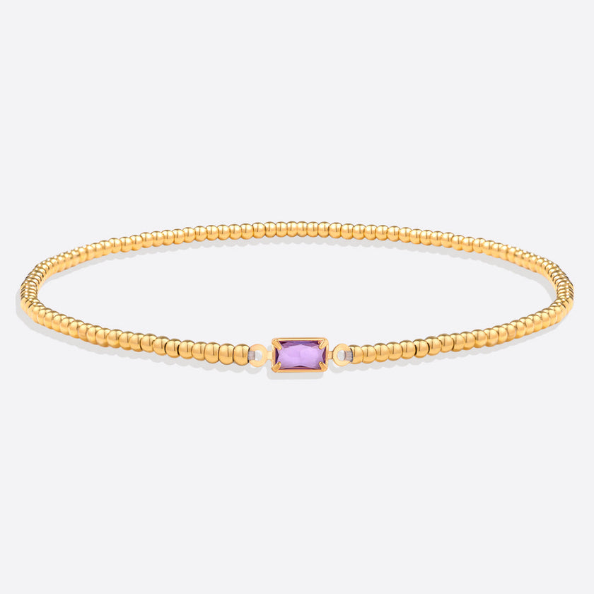 Pulsera de cuentas doradas con piedra natal
