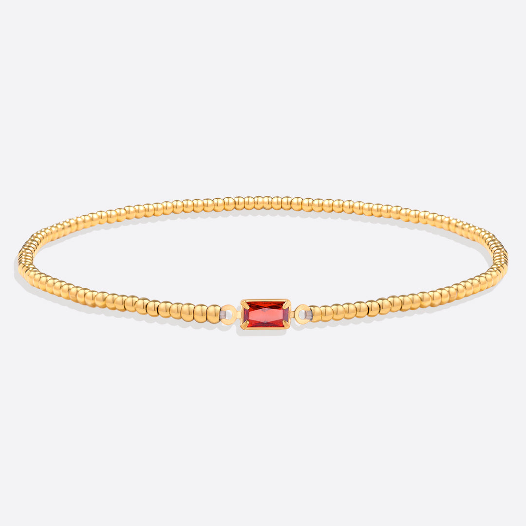 Pulsera de cuentas doradas con piedra natal