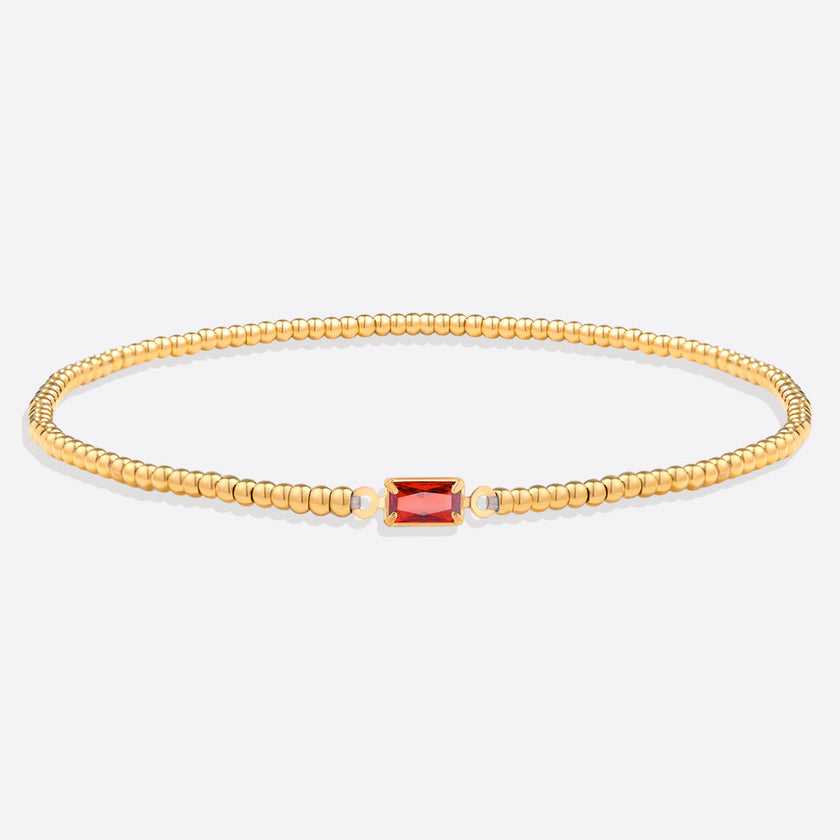 Pulsera de cuentas doradas con piedra natal