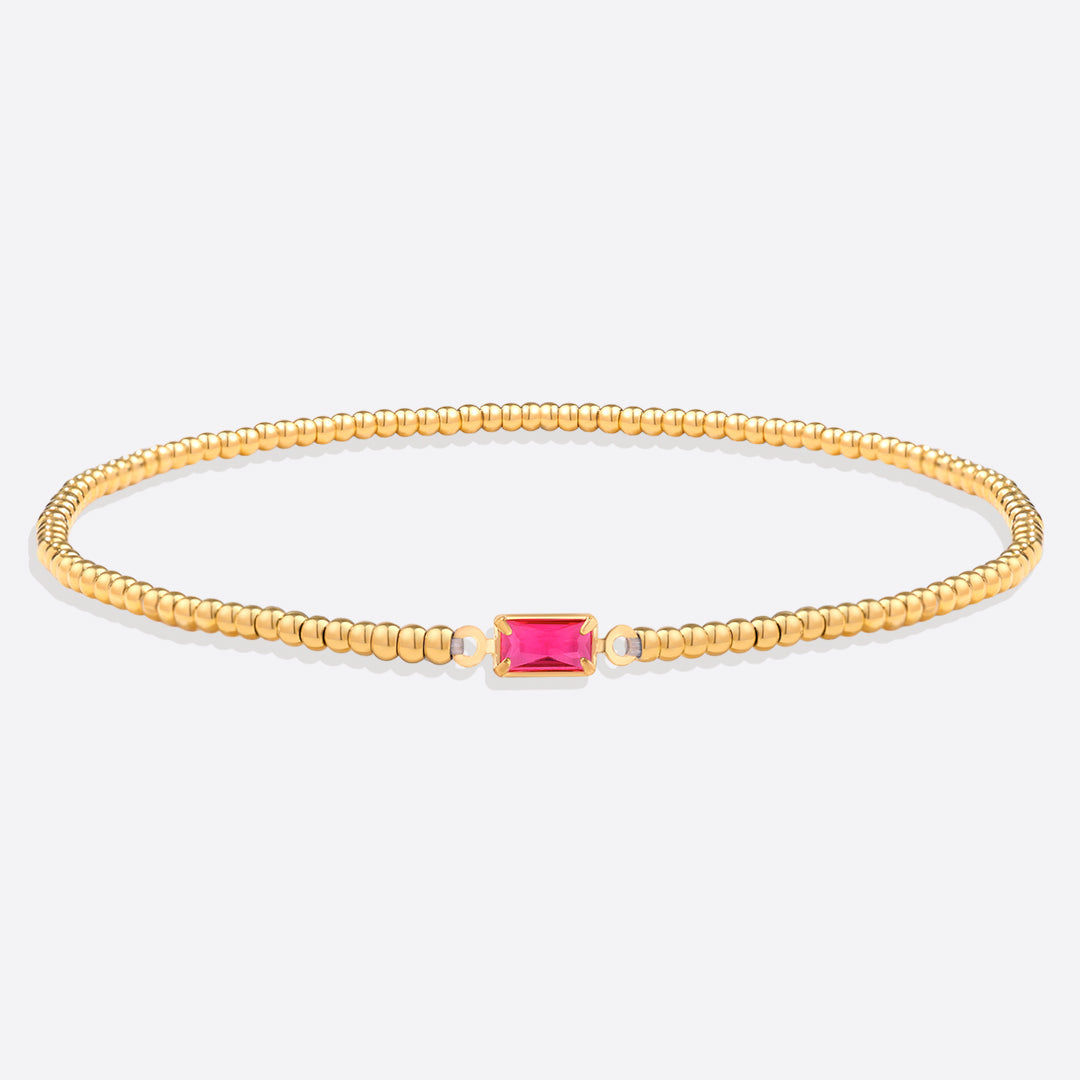 Pulsera de cuentas doradas con piedra natal
