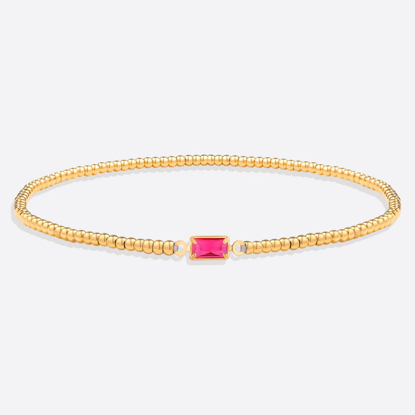 Pulsera de cuentas doradas con piedra natal