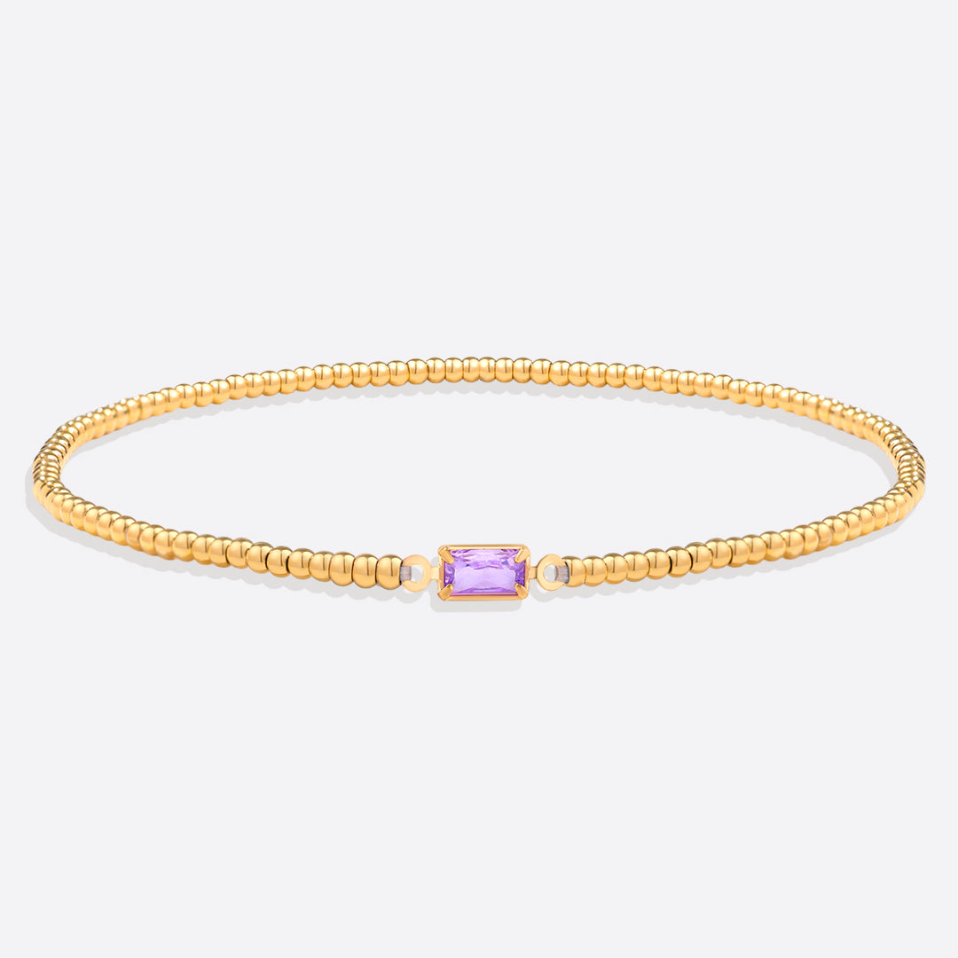 Pulsera de cuentas doradas con piedra natal
