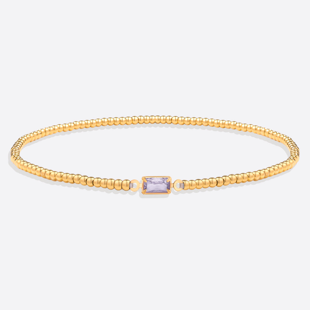 Pulsera de cuentas doradas con piedra natal