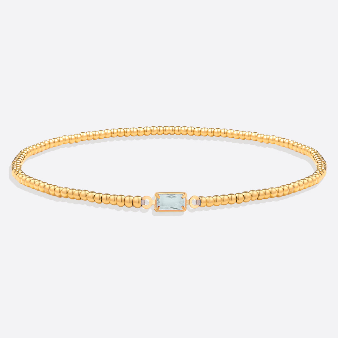 Pulsera de cuentas doradas con piedra natal