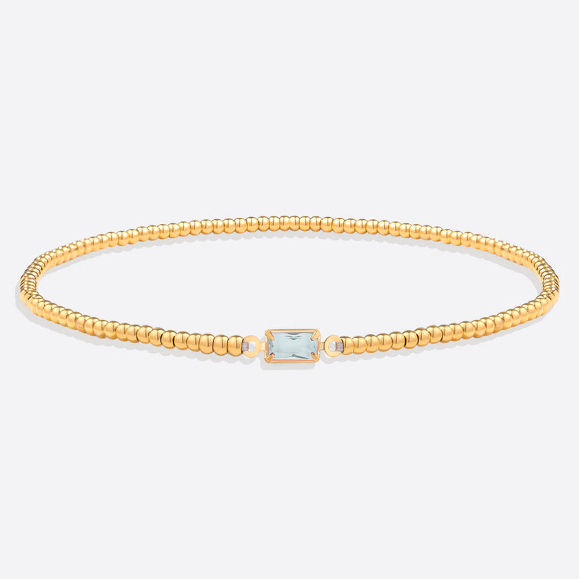 Pulsera de cuentas doradas con piedra natal