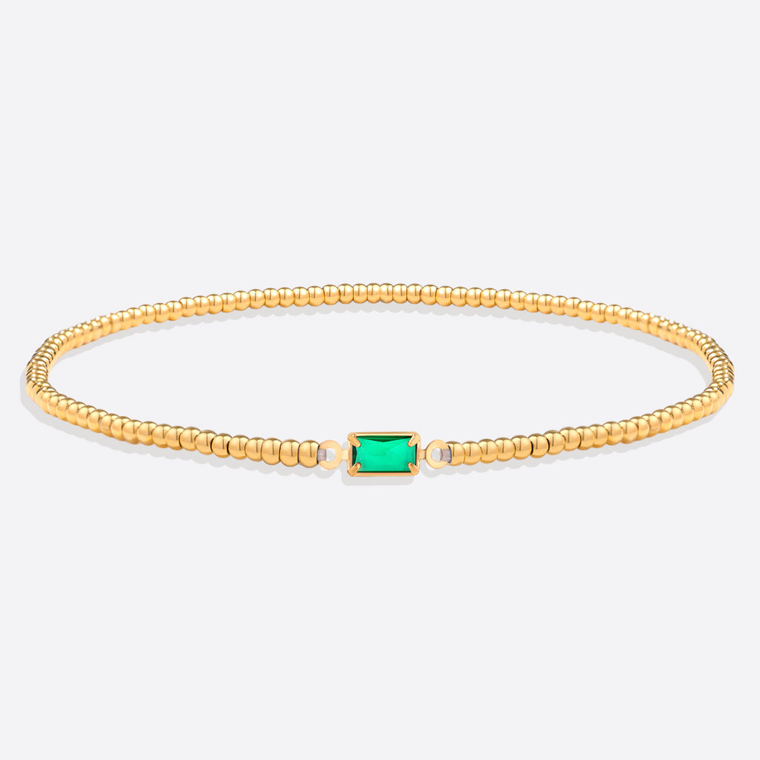 Pulsera de cuentas doradas con piedra natal