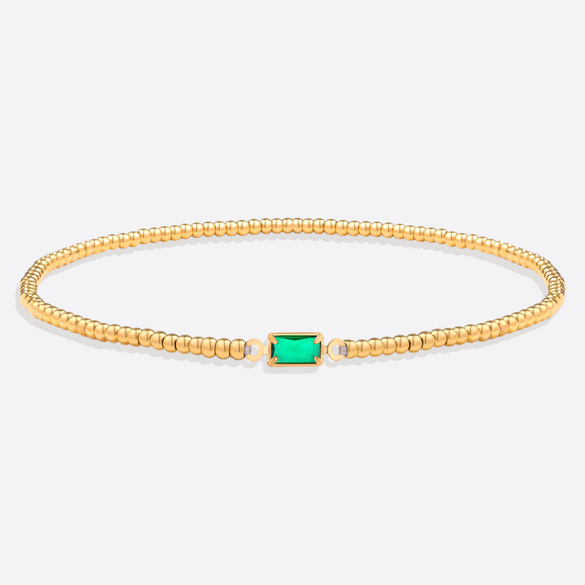 Pulsera de cuentas doradas con piedra natal