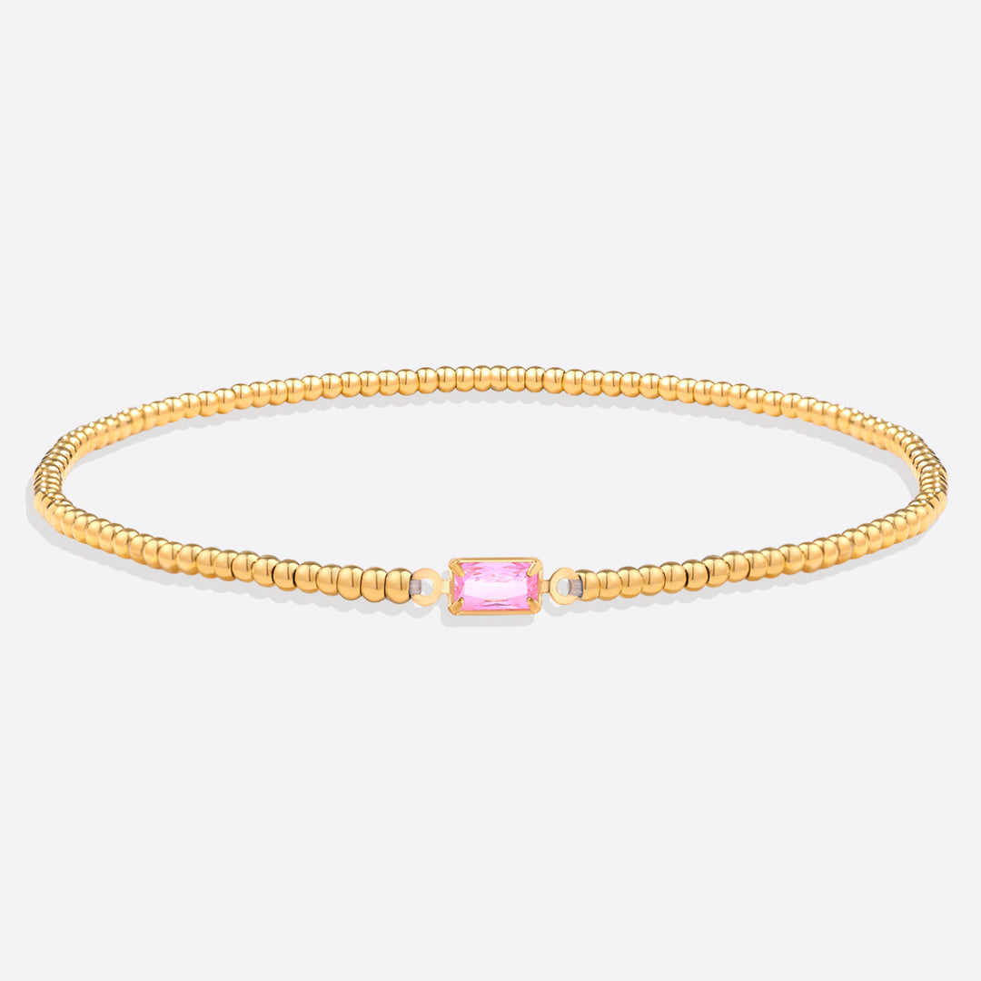 Pulsera de cuentas doradas con piedra natal