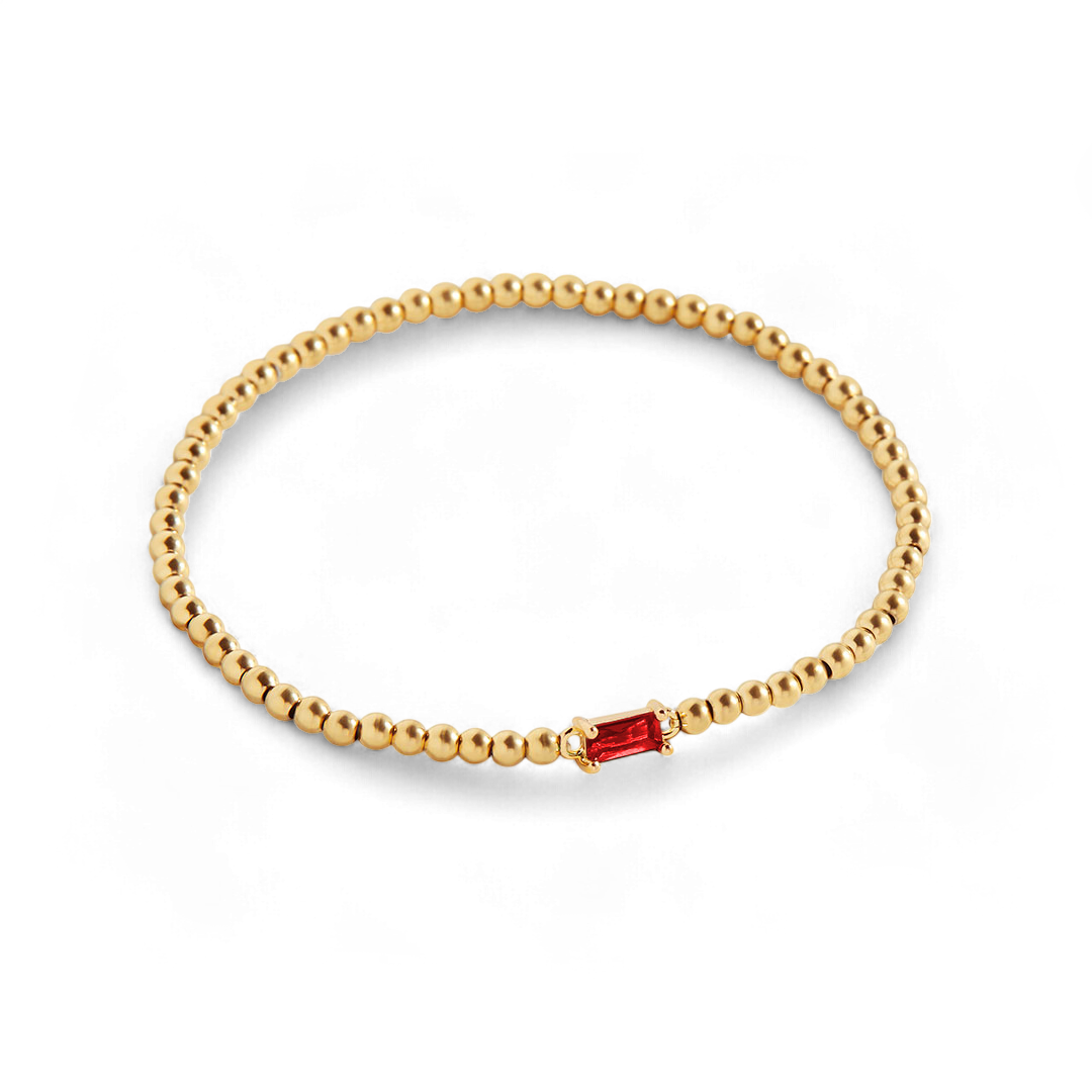 Pulsera de cuentas doradas con piedra natal