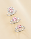 Pink Sapphire Oval Cut Three Stone Engagement Ring in Sterling Silver