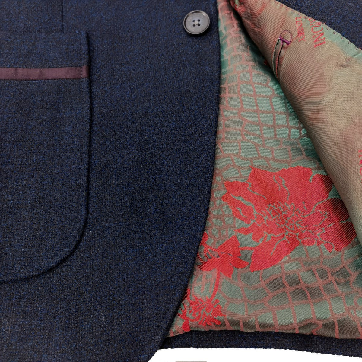 Blazer de tweed entallado azul marino