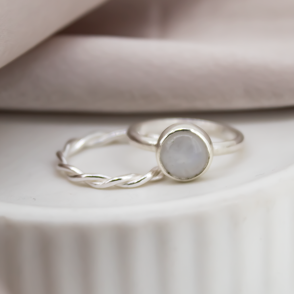 Twisted Stacking Rings