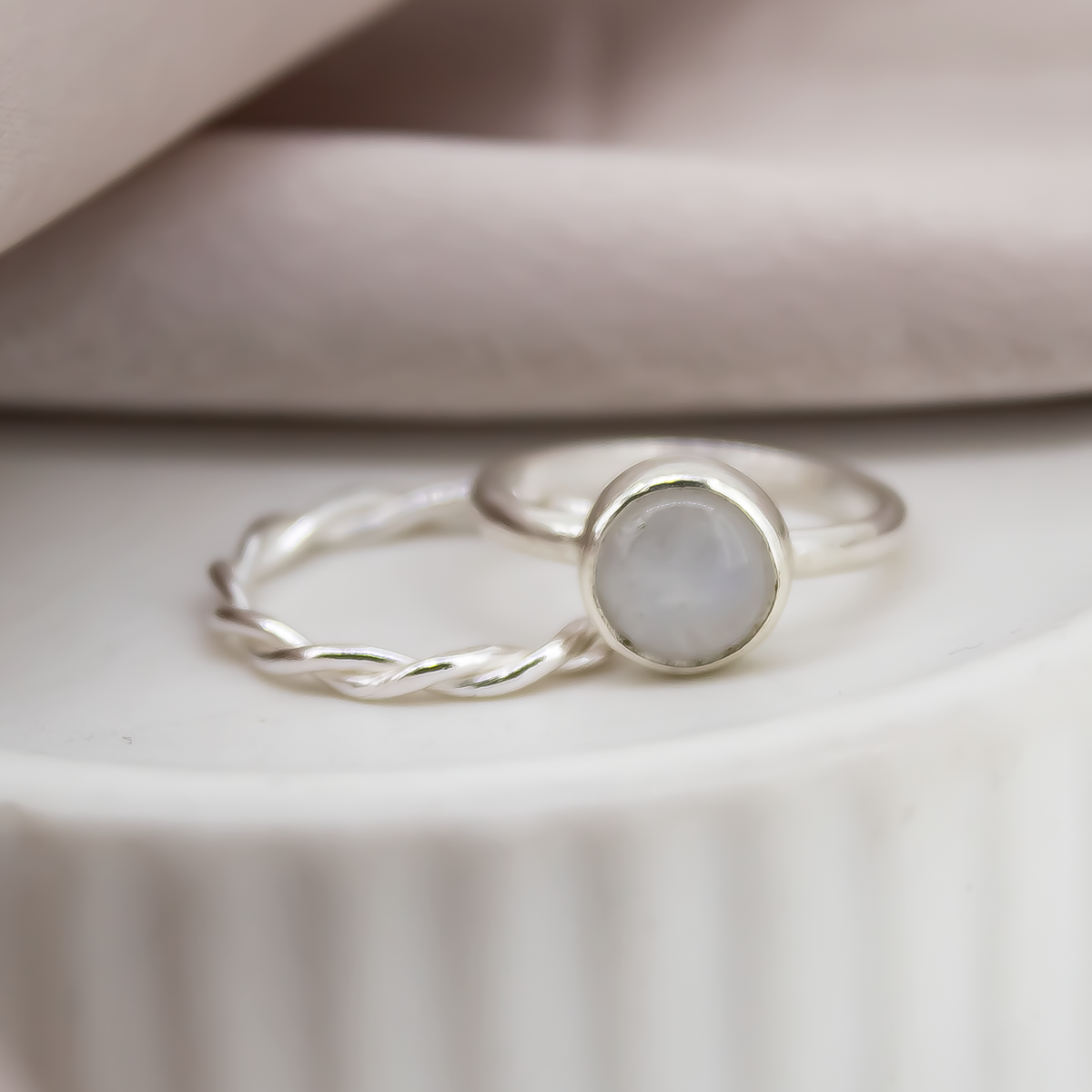 Twisted Stacking Rings