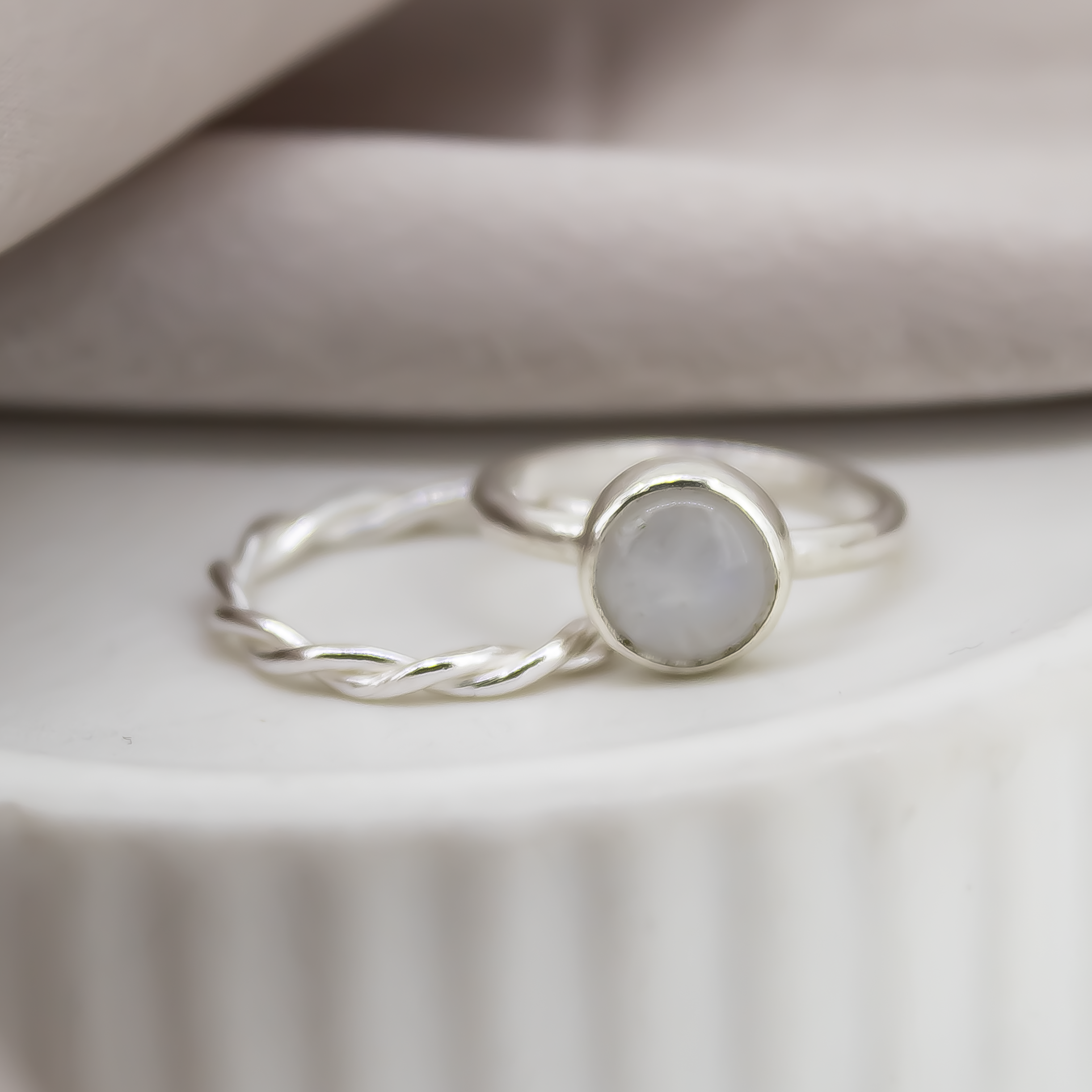 Twisted Stacking Rings