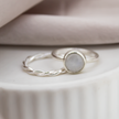 Twisted Stacking Rings
