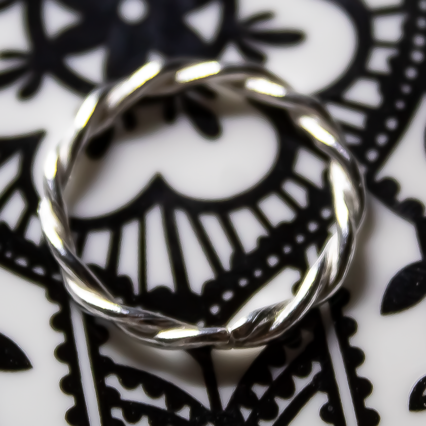 Twisted Stacking Rings