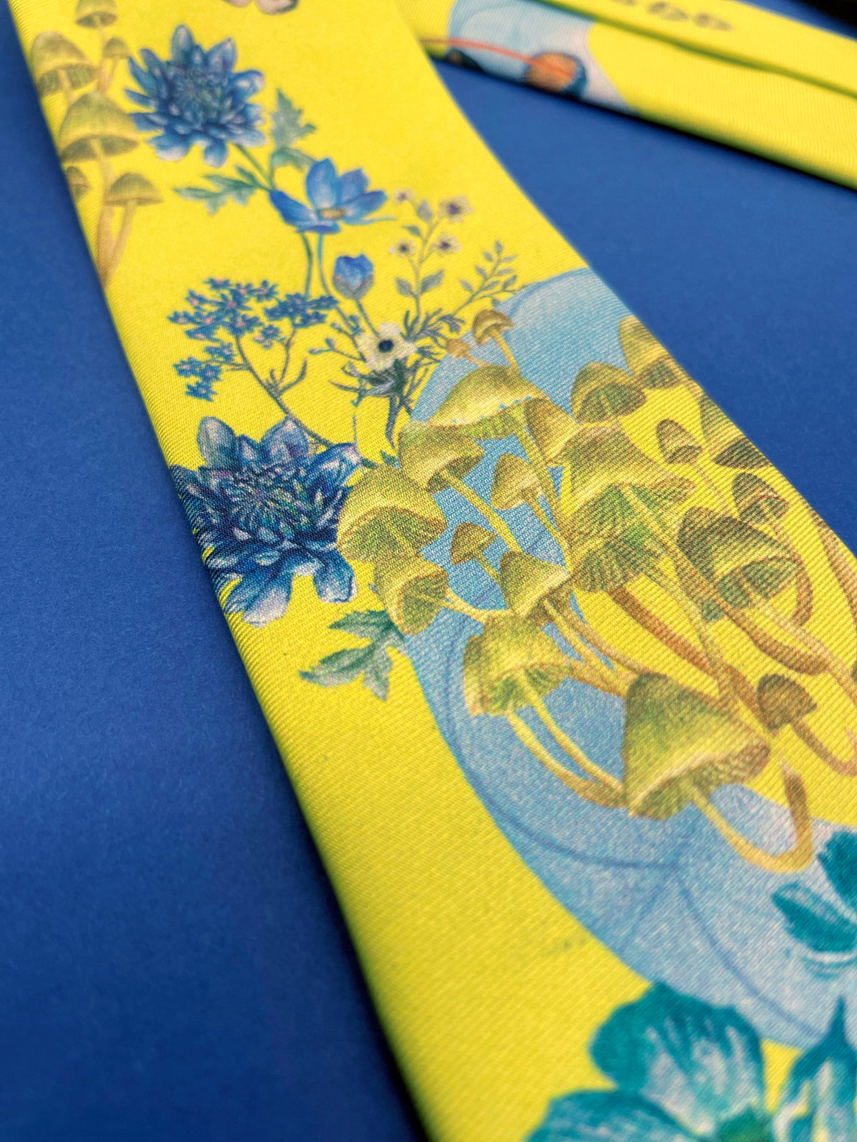 Vibrant yellow and pale blue ‘Luciferin’ floral silk tie