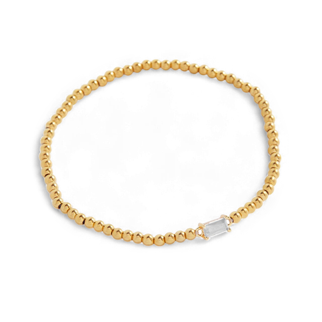 Pulsera de cuentas doradas con piedra natal