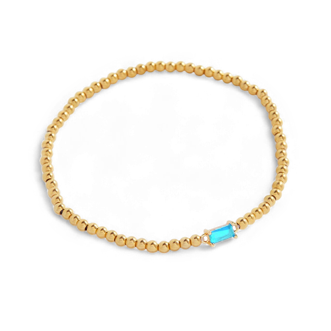 Pulsera de cuentas doradas con piedra natal