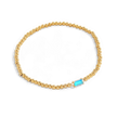 Pulsera de cuentas doradas con piedra natal