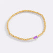 Pulsera de cuentas doradas con piedra natal