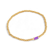 Pulsera de cuentas doradas con piedra natal