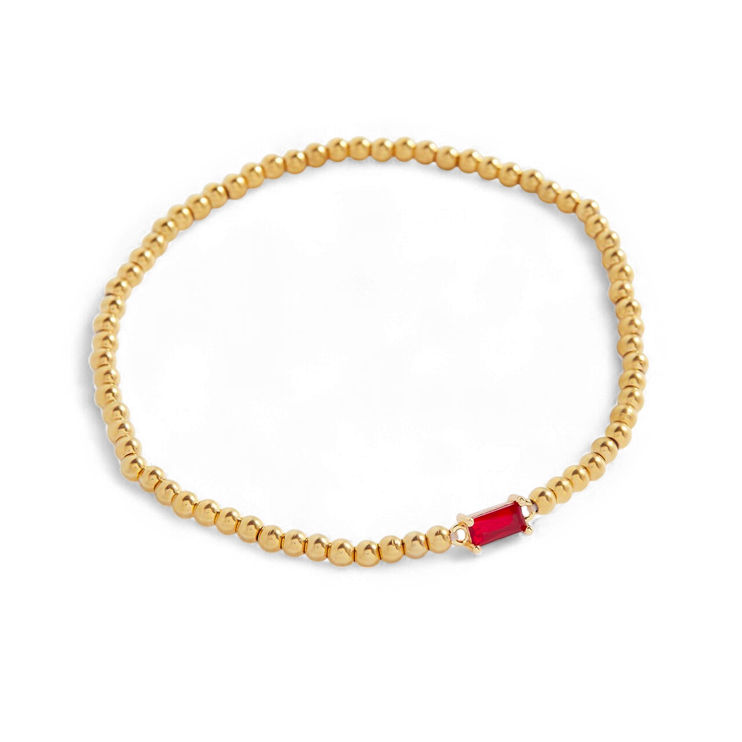 Pulsera de cuentas doradas con piedra natal
