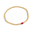 Pulsera de cuentas doradas con piedra natal