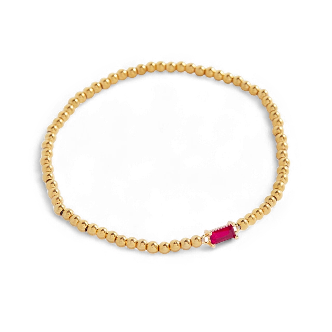 Pulsera de cuentas doradas con piedra natal