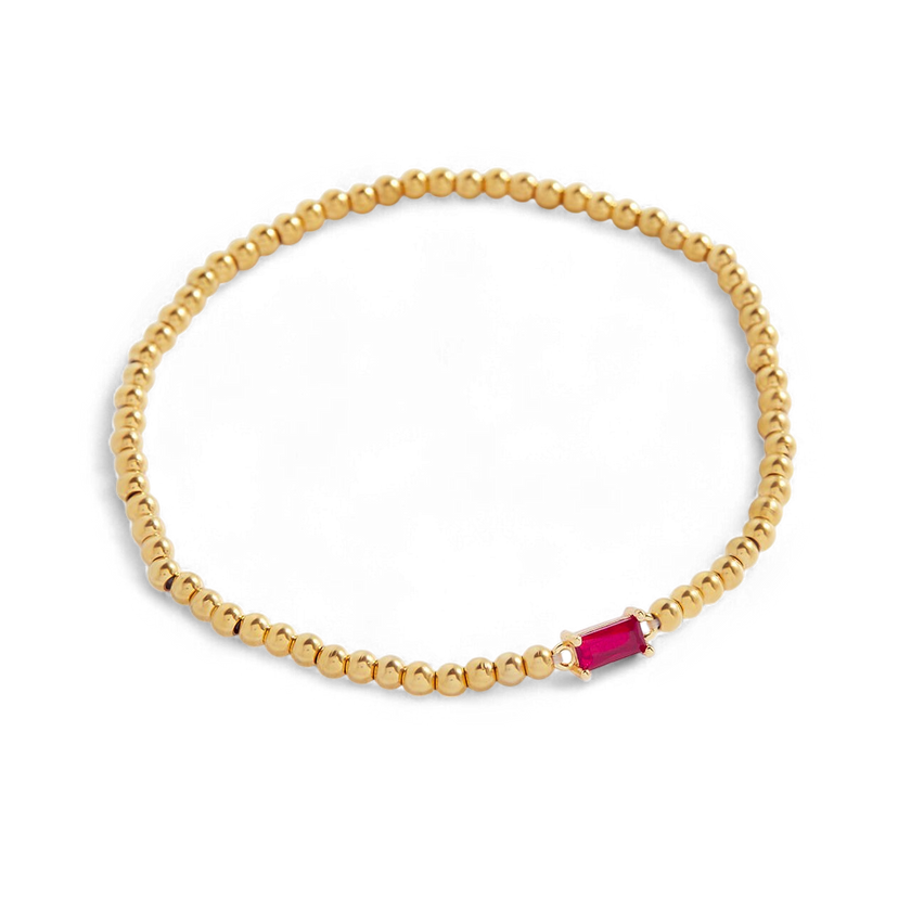 Pulsera de cuentas doradas con piedra natal