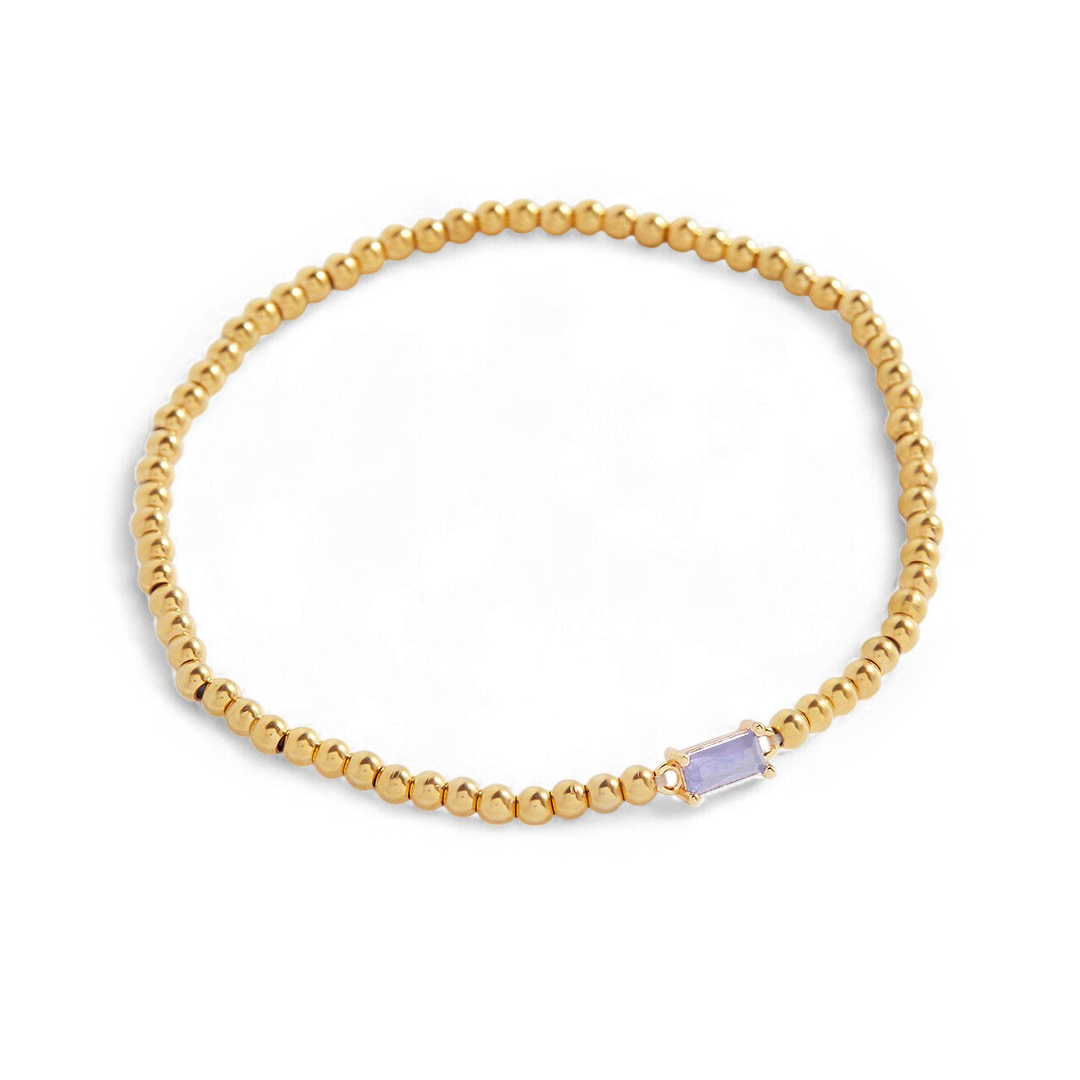 Pulsera de cuentas doradas con piedra natal