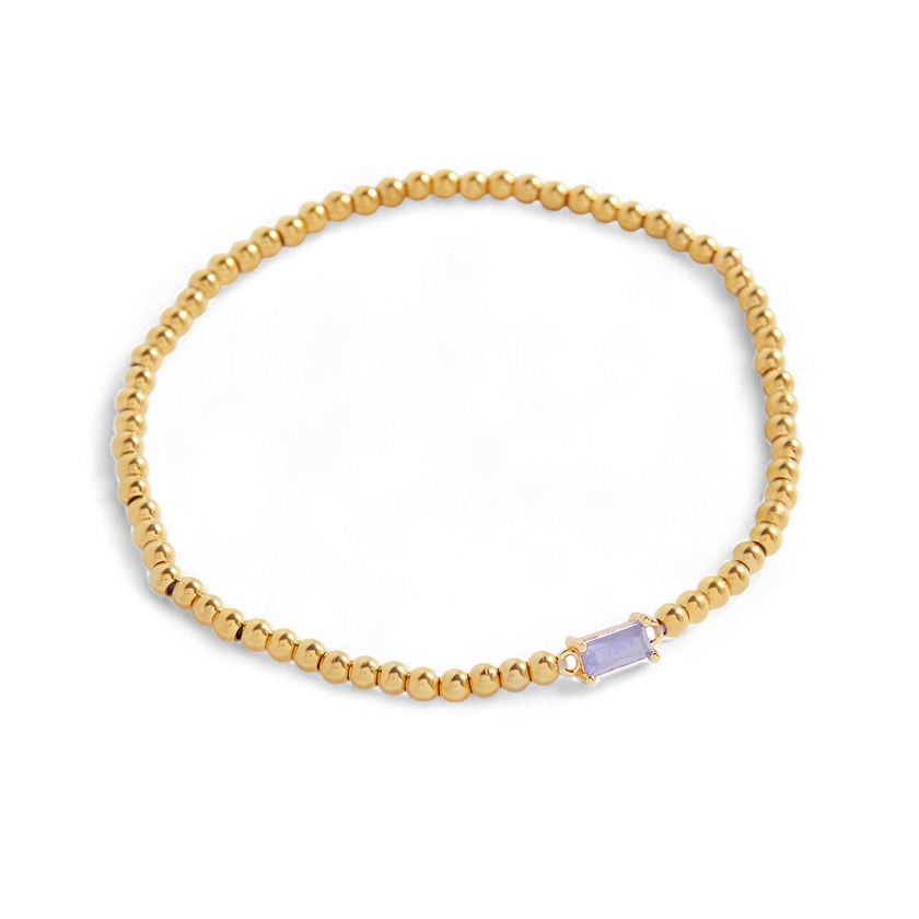 Pulsera de cuentas doradas con piedra natal