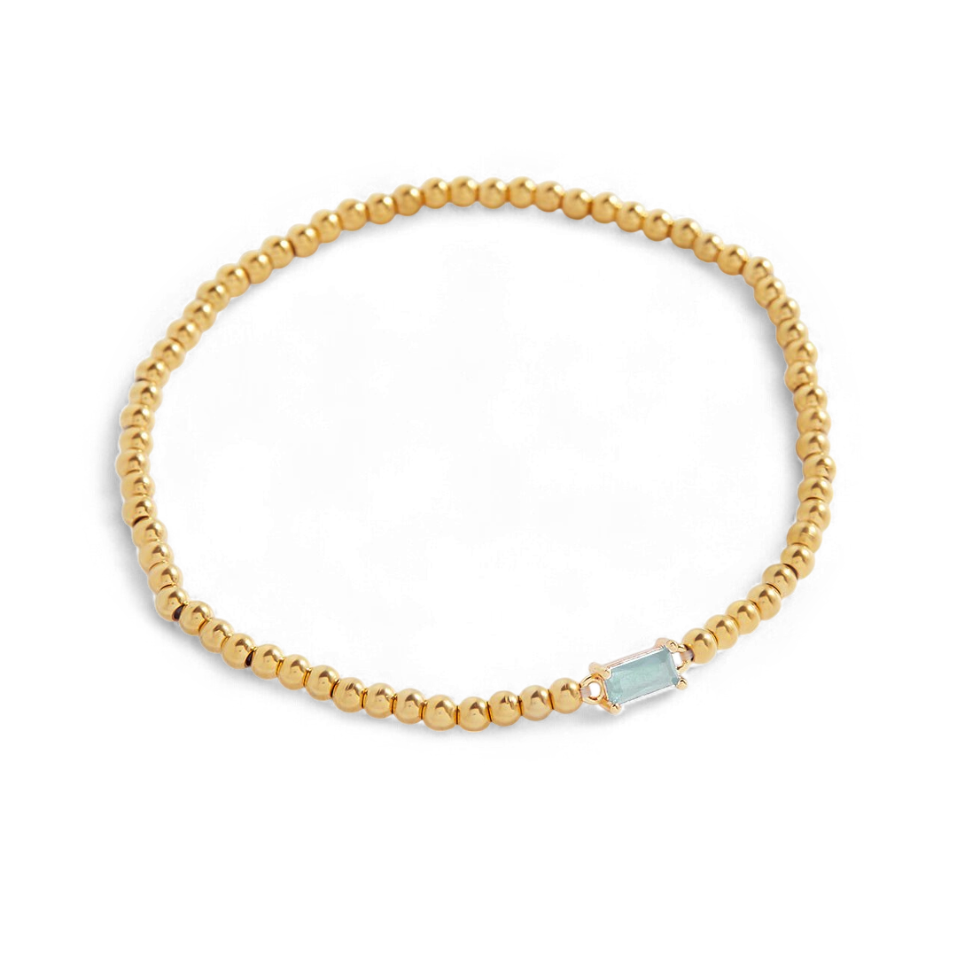 Pulsera de cuentas doradas con piedra natal