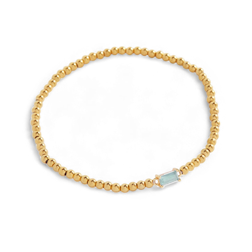 Pulsera de cuentas doradas con piedra natal