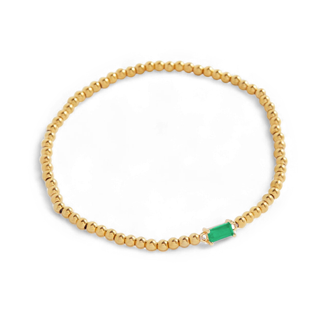 Pulsera de cuentas doradas con piedra natal