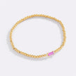 Pulsera de cuentas doradas con piedra natal